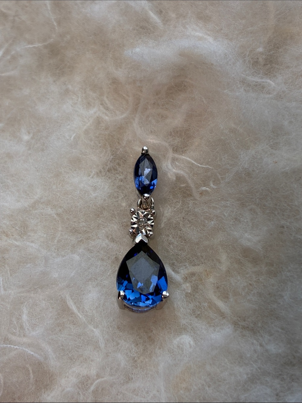 Blue Sapphire Pendant with Small Diamond 
Pendant 10 K. Silver tone necklace